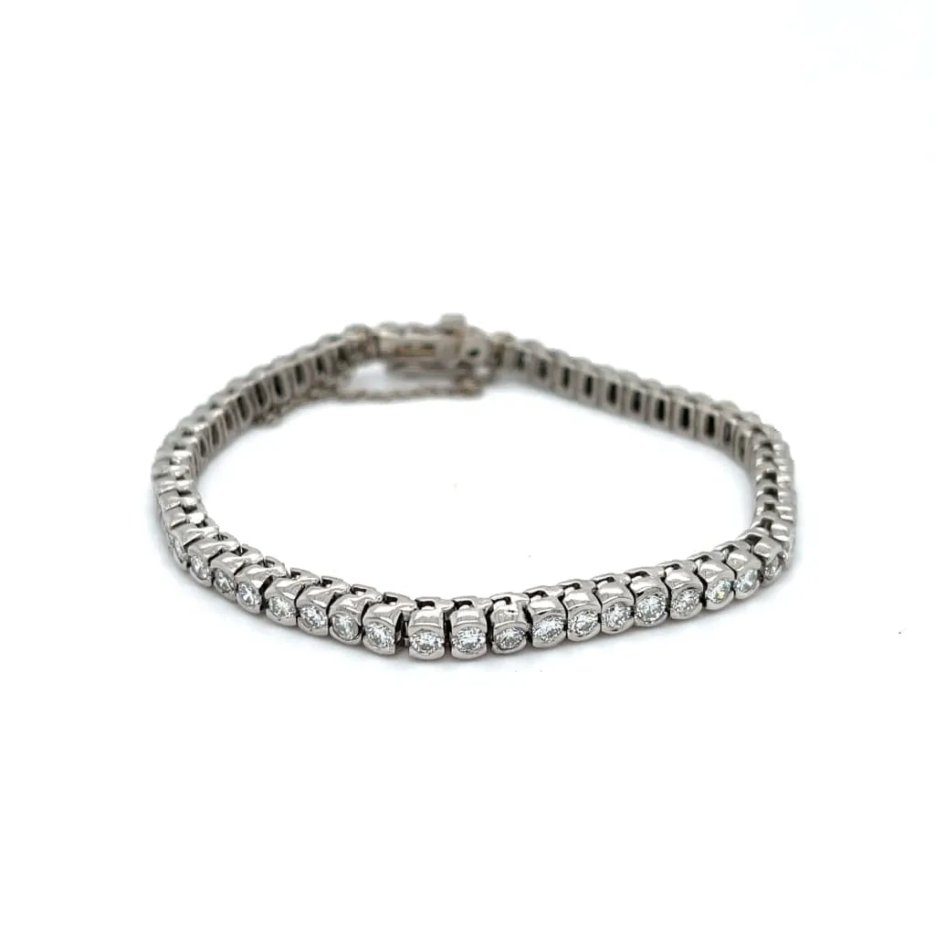 4 CTTW NATURAL DIAMOND HALF BEZEL TENNIS BRACELET IN PLATINUM AT REGARD JEWELRY IN AUSTIN, TEXAS